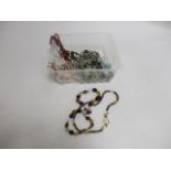 A quantity of costume jewellery, to include hardstone and seed pearl necklaces, amethyst pebbles,