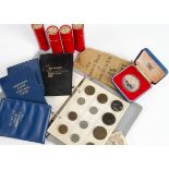 A collection of coins, including a cased 1977 silver proof crown, quantity of pennies and half