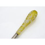 A fine Victorian lady's glass topped walking cane, having yellow and white cameo glass handle,