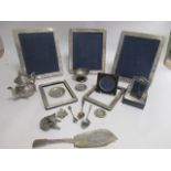 A small quantity of silver and plated wares, to include five hallmarked silver photograph frames and