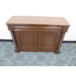 A Victorian mahogany chiffonier base, with one long convex drawer, above two arch panel doors,