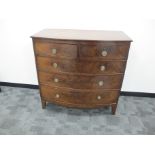 A 19th Century mahogany bow fronted chest of drawers, with two short above three graduated long