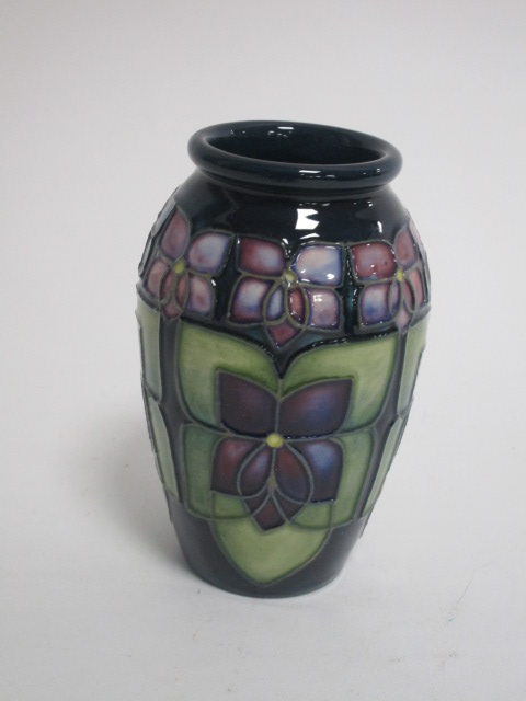 A contemporary Moorcroft pottery vase, of ovoid form, in the 'Violet' pattern designed by Sally - Image 2 of 3