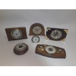 1930s and Later Clocks and Barometers, two wall hanging aneroid barometers one circular with