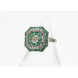 A contemporary Art Deco style emerald and diamond tablet dress ring, the old cut diamond in rubbed