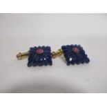 A pair of lapis and ruby cufflinks, each gilt mount stamped 925