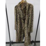 A ladies 1930s vintage snow leopard fur coat, by Olive, with brown silk lining, length 110cm