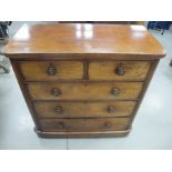 A Victorian mahogany rounded cornered chest of drawers, with two short and two long, plus a