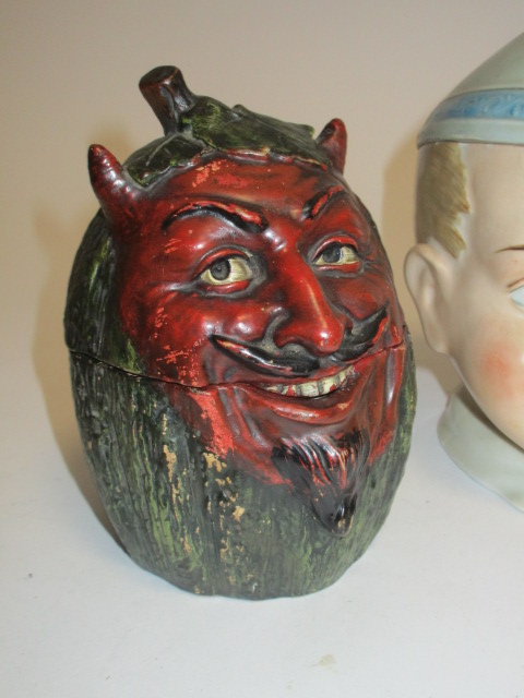An early 20th Century Mephistopheles or Devil figural tobacco jar, height 15cm, together with four - Image 2 of 5