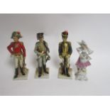 Three 20th Century porcelain soldiers, together with a continental figure of a lady in the Edwardian