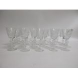 A set of twelve 20th Century Edinburgh Crystal wine glasses, with cut star bases, height 16cm,