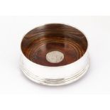 A small modern wine bottle coaster from B & Co, London 1997, 9.5cm diameter, overall good