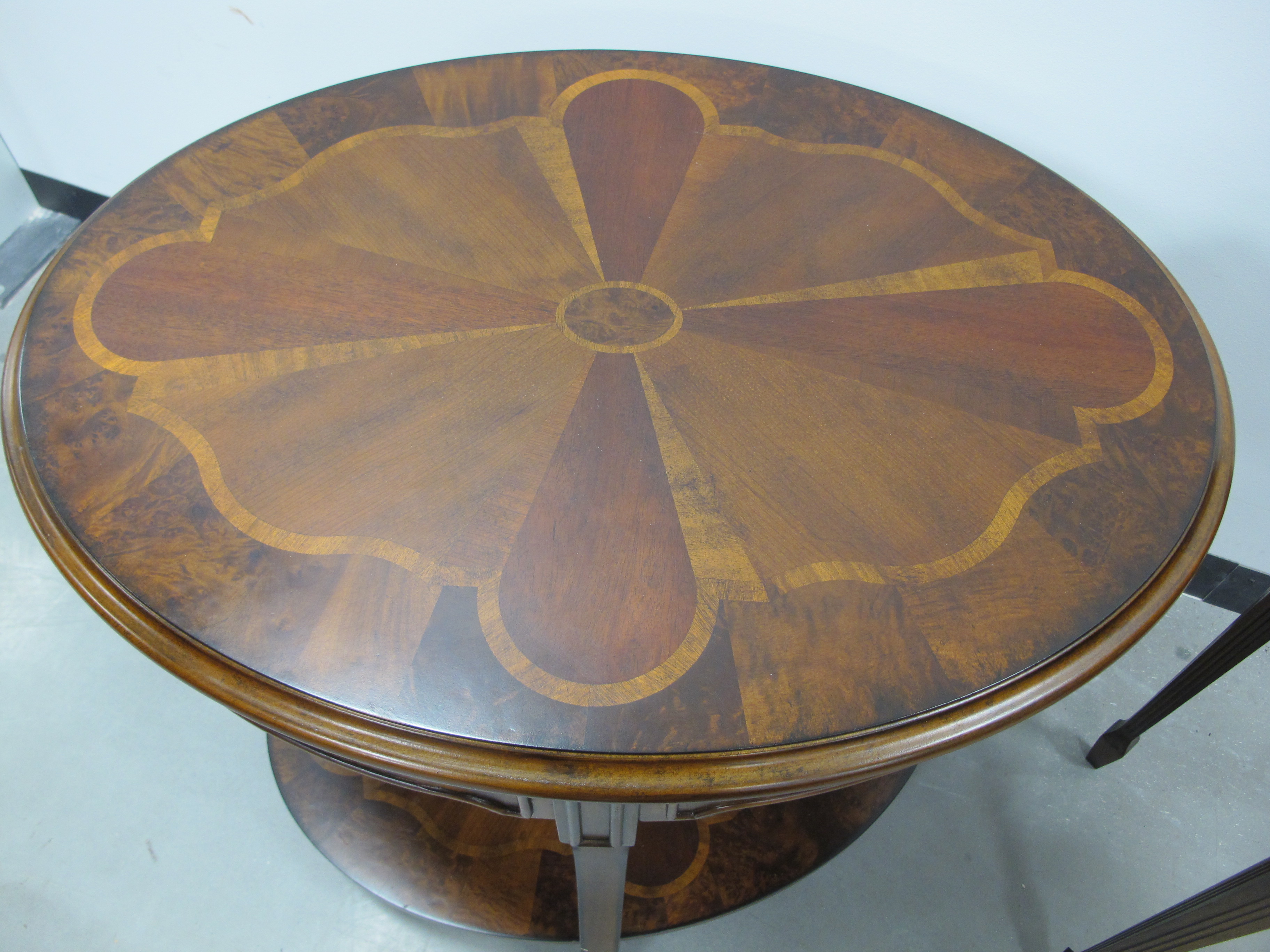 A contemporary mahogany and walnut two tier oval centre table, inlaid fan design to top and lower - Image 2 of 4