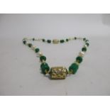 A jade and cultured pearl silver gilt necklace, 43cm long