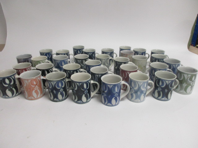 A collection of Aldermaston pottery cups, thirty two signed by Jenny Jowett and one by Alan Caiger- - Image 2 of 7