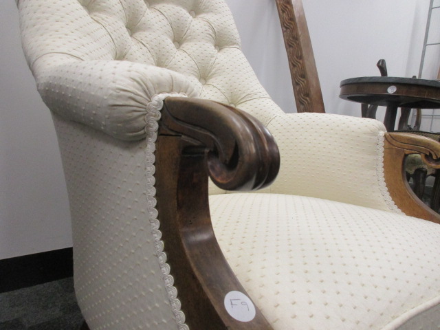 A 19th Century button back armchair, with oak scroll arms and turned supports, upholstered in an - Image 2 of 3