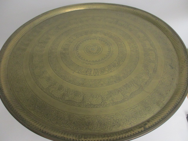 A table with Middle Eastern brass top, with various foliate, animal and script borders, diameter - Image 2 of 3