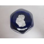 A 20th Century Baccarat paperweight 'Libre', with multifaceted sides and internal scales, height