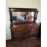 Edwardian Oak Mirror Back Chiffonier, with two waist drawers above panelled doors and central carved