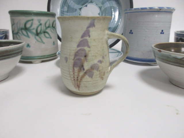 A collection of Aldermaston pottery, including a large circular dish with blue brushwork upon a - Image 3 of 5