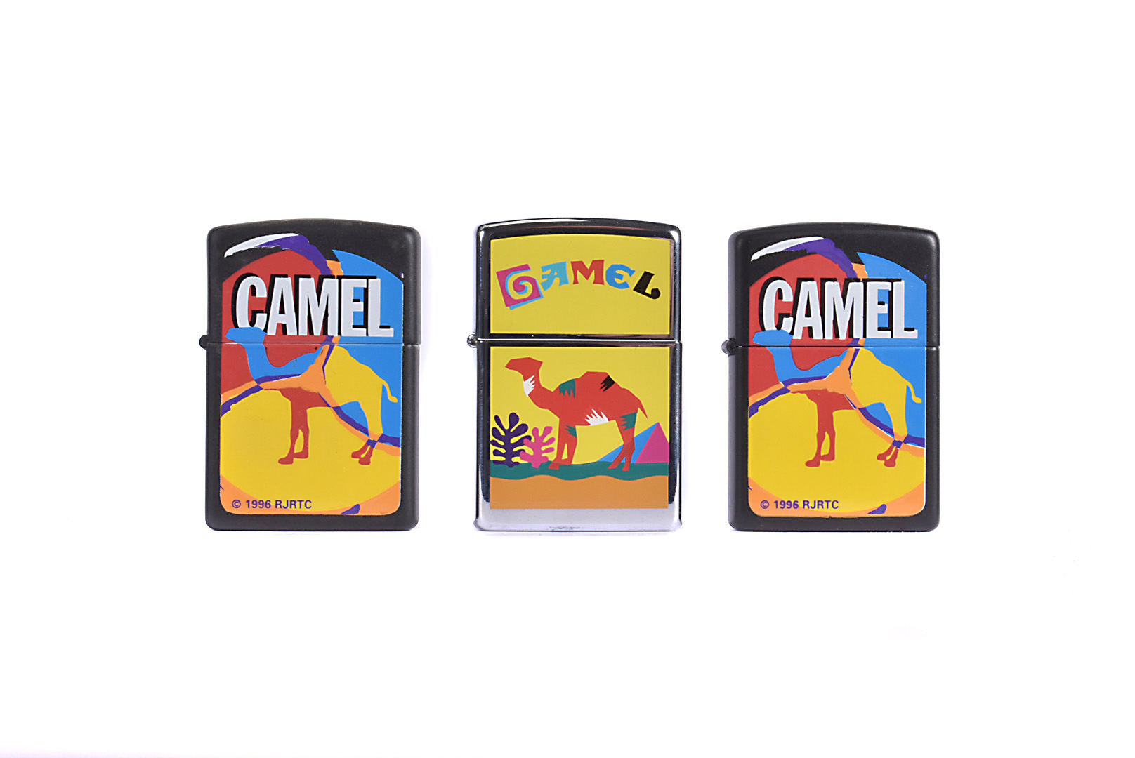 A 1996 Cactus Camel Zippo Lighter, dated 1996, together with two Pop Art Zippo lighters, dated 1996,