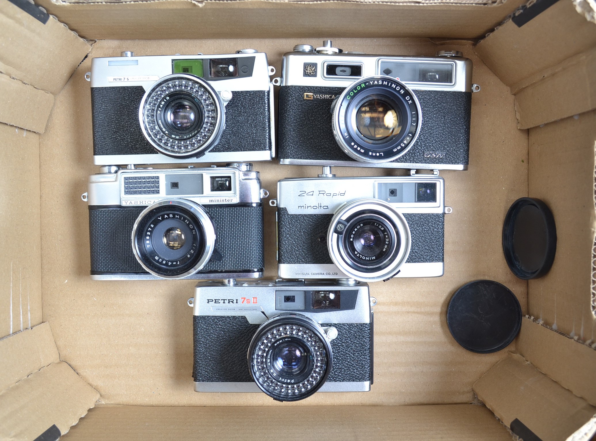 Five Ranger Cameras, a Yashica GSN, with 45mm f/1.7 lens, Minster, with 4.5cm f/2.8 lens, Petri 7 s,