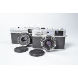 Two Olympus Compact Cameras, an Olympus 35 RC, with E Zuiko 42mm f/2.8, untested, and an Olypus Trip