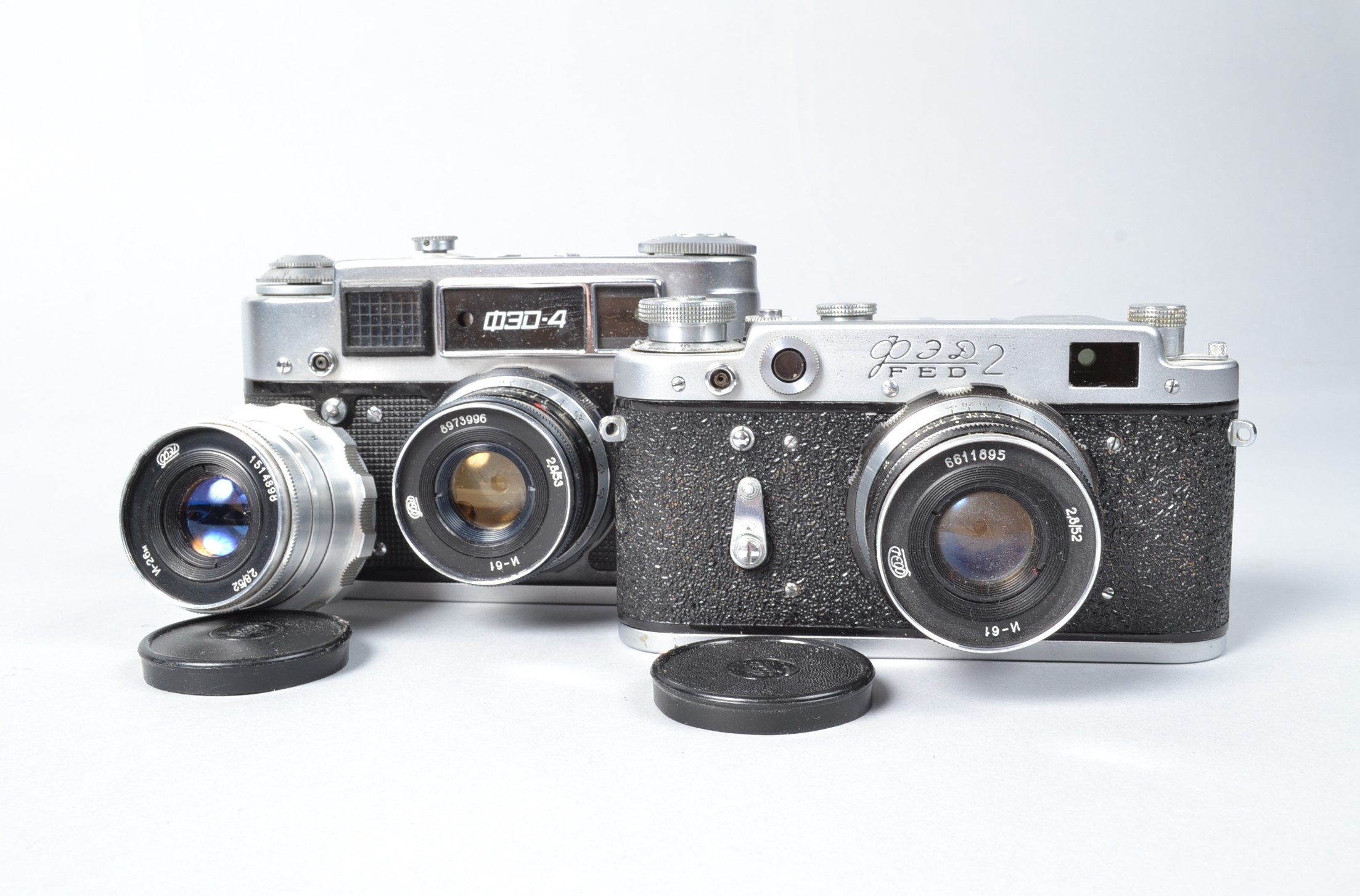 Two FED Cameras, a FED 2, with N-61 52mm f/2.8 lens and a FED 4, with N-61 53mm f/2.8 lens and a Fed