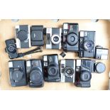 A Tray of Compact Cameras, a Minox 35 EL, Konica C 35, AF, Yashica 35-ME, Pentax Zoom 70, Zoom 70 X,