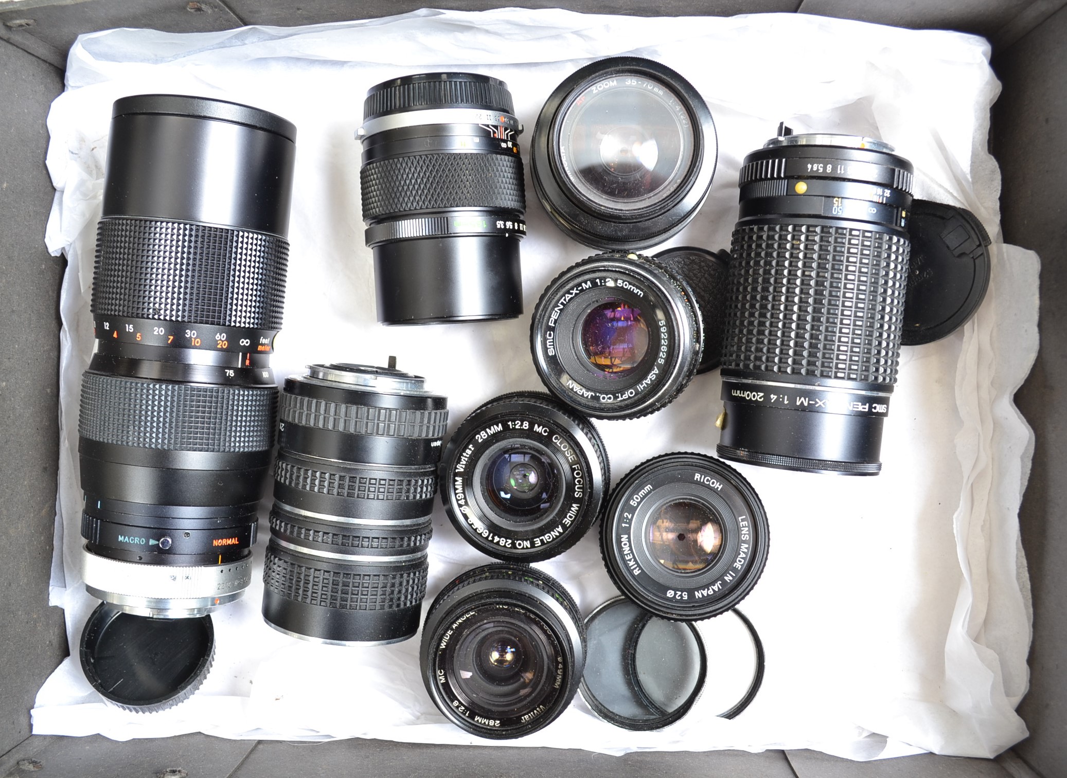 Various Lenses, different mounts, including an Olympus Auto-T E Zuiko 135mm f/3.5, Pentax-M 50mm f/