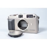 A Contax GI 35mm Body, serial no 015895, body VG, powers up, shutter fires, otherwise untested, with