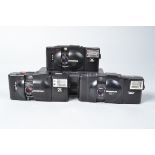 Olympus XA Compact Cameras, an Olympus XA, with A11 flash, XA-1, with A9M flash, XA-2, with A11