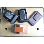 Polaroid Cameras, a Polaroid SX-70 Alpha 1, SX-70 Sonar auto focus (AF), SX-70 model 2, cracking