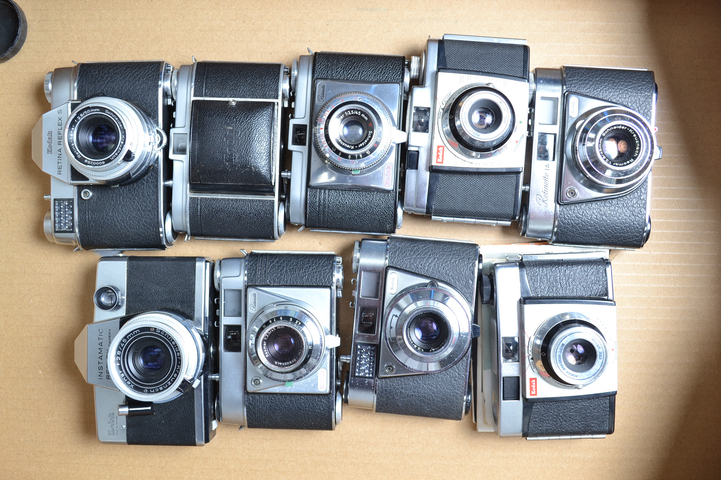 A Tray of Kodak Cameras, A Retina I b, Reflex S, Instamatic Reflex, Retinette f, I, I A, I B and two