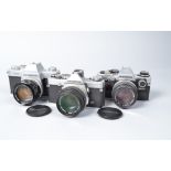Three Olympus SLR Cameras, an Olympus FTL, with G Zuiko Auto-S 50mm f/1.4 lens, OM-1, with Zuiko