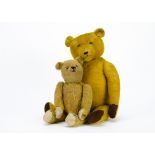 Two German teddy bear 1920-30s, the larger with short bright golden mohair, pronounced muzzle, black