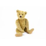 ’Lewis’ an interesting Steiff teddy bear circa 1910, with shorter golden mohair, black boot button