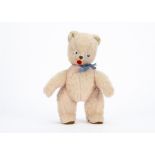 An unusual French pink wool plush teddy bear 1950s, with blue, white and black googly eyes, small