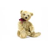 ’Caeser’ an early Steiff centre-seam teddy bear circa 1908, with dark blonde mohair, black boot