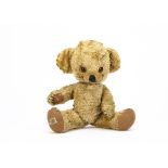 A Merrythought artsilk plush Cheeky teddy bear, with blonde artificial silk plush, orange and