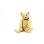 ’Rory’ a 1920s Steiff teddy bear, with golden mohair, brown and black glass eyes, pronounced muzzle,