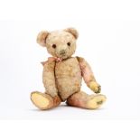 A rare Merrythought pink artificial silk plush teddy bear 1930s, with orange and black glass eyes,