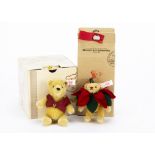 Two Steiff limited edition Christmas tree teddy bear ornaments: Teddy bear poinsettia ornament,