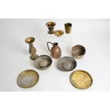 A small quantity of Middle Eastern metal ware, including a pair of copper bowls with repousse floral