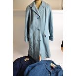 Three vintage Aquascutum wool blend coats, in various shades of blue,