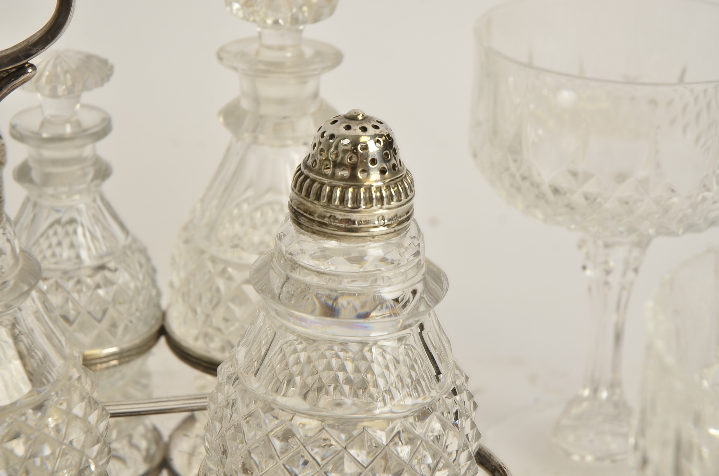 A seven part cruet set on plated stand, with a Georgian pierced silver lid, hallmarked for Sheffield - Image 5 of 5