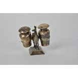 A South American silver cruet set, taking the form of an Llama carrying pots, possibly Peruvian,