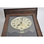 A Gledhill-Brook time recorders ltd clocking in clocking out patent clock, in a wooden case, with