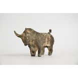 An Eastern tomb figure of a bull, 7cm x 14cm