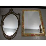 Contemporary wall mirrors, one in the classical style with urn and swag decoration the other